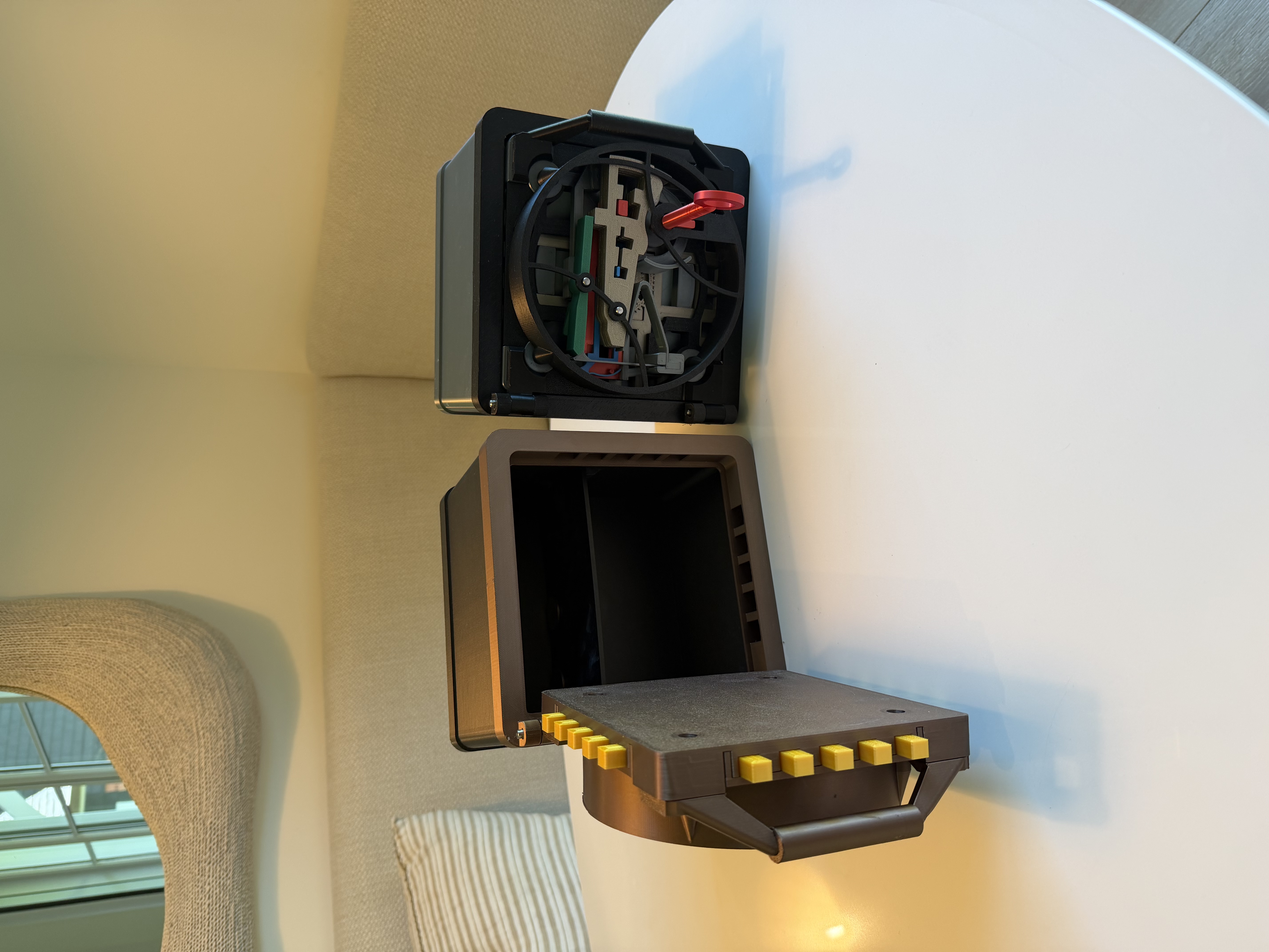 Two 3D printed vaults side by side, doors open