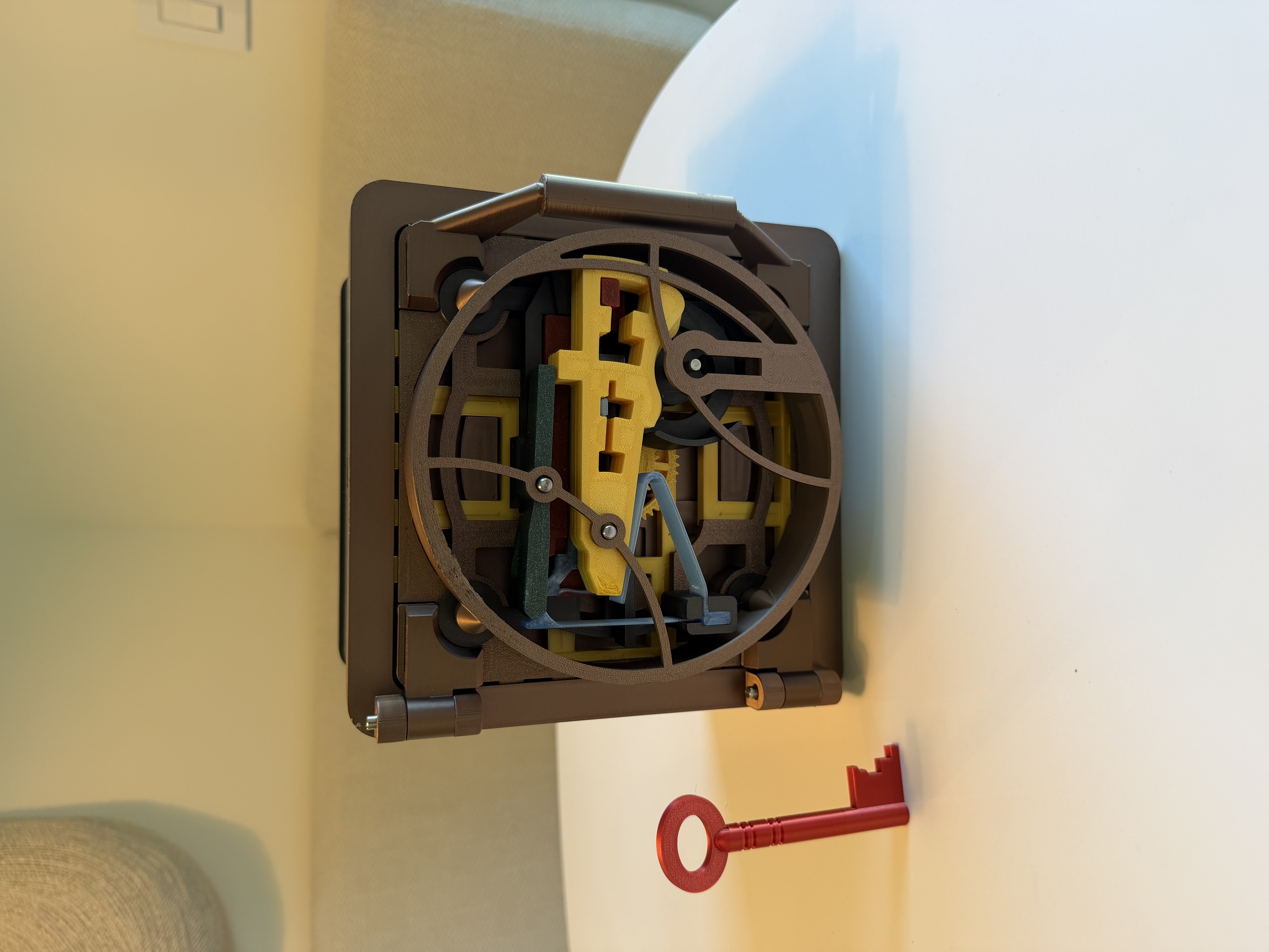 3D printed bronze vault with red key