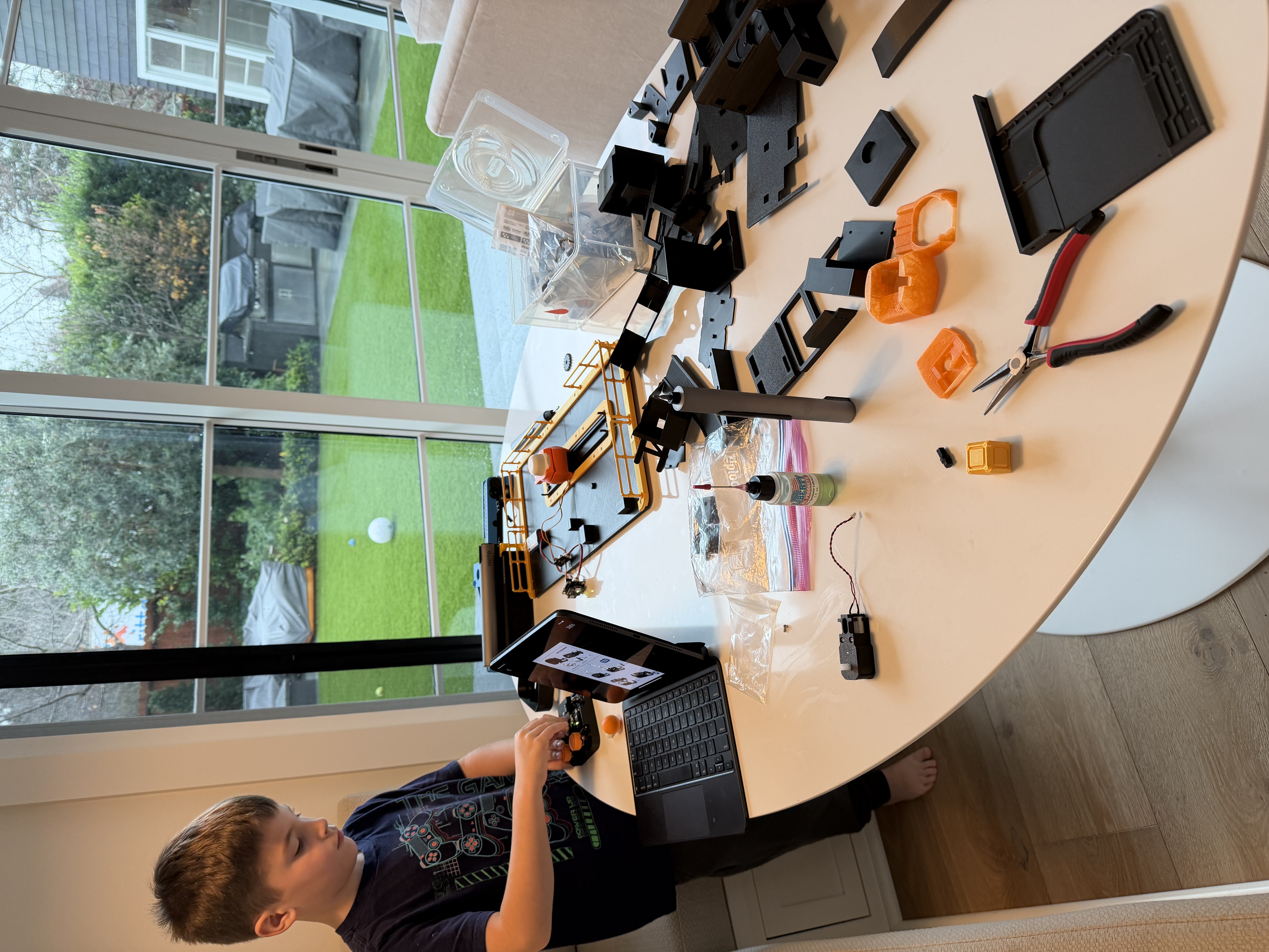 Luke working on RC car build