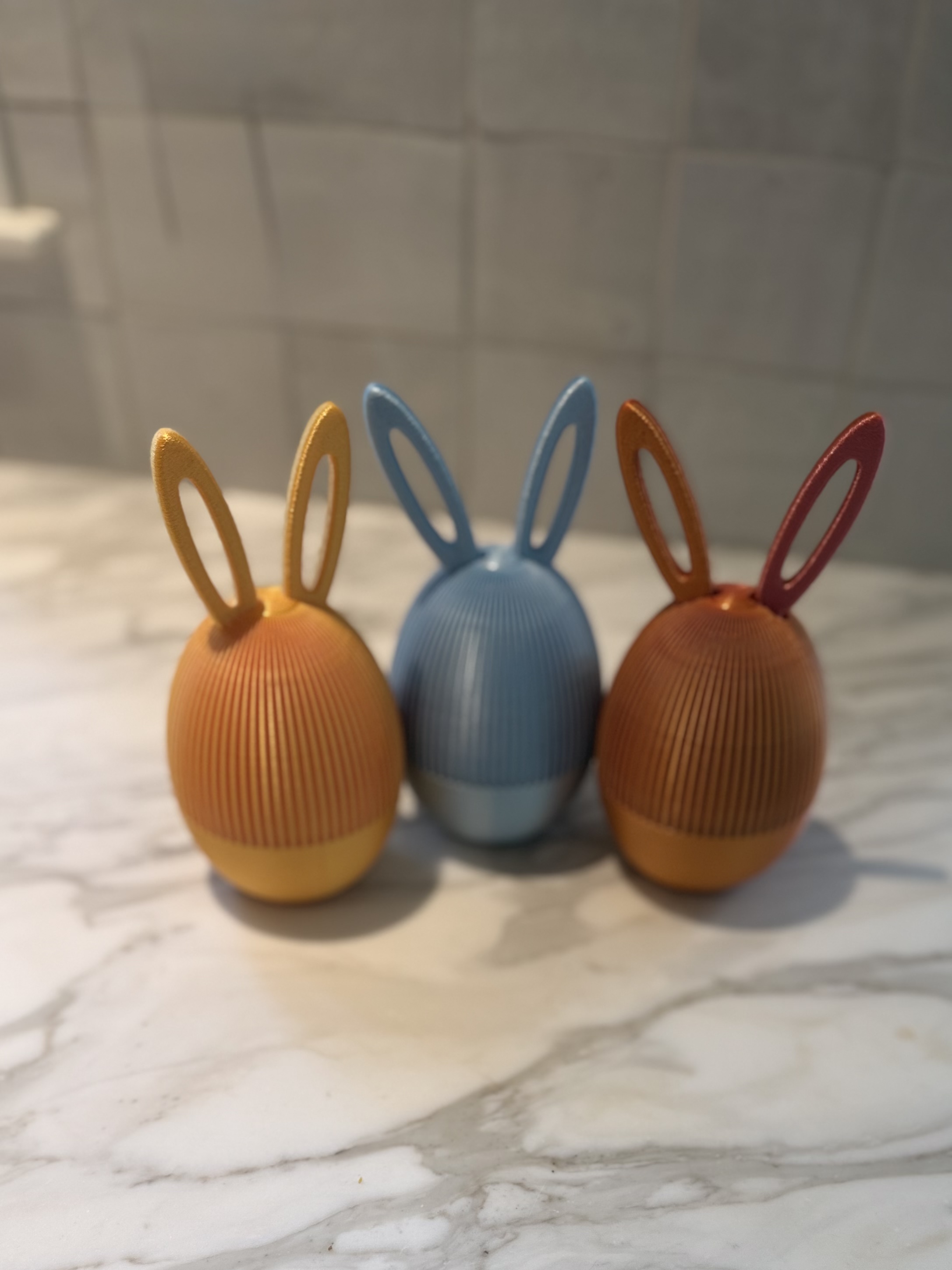 3D printed bunny eggs trio in yellow blue and orange