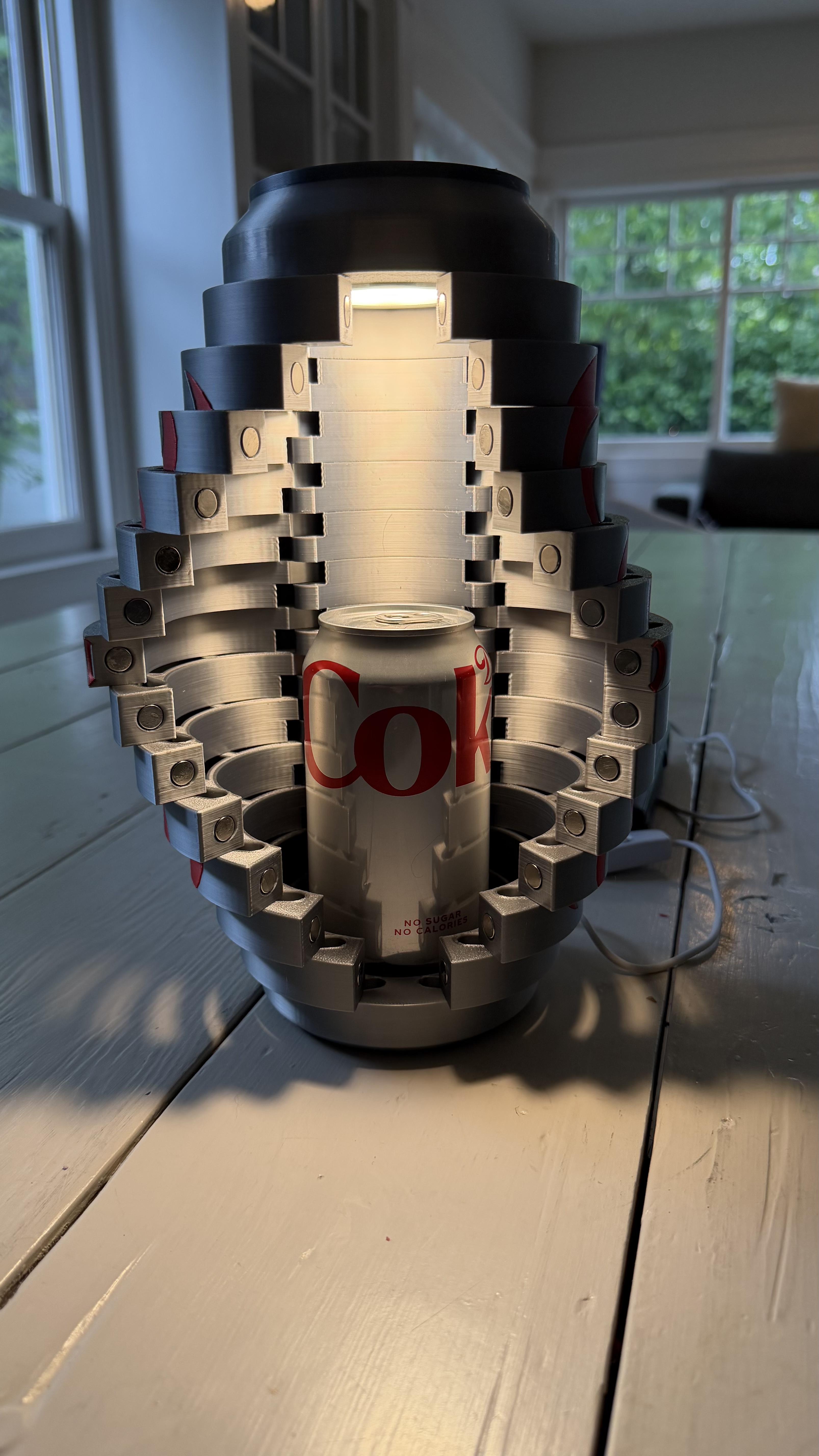 3D printed secret Diet Coke can lamp open showing light inside